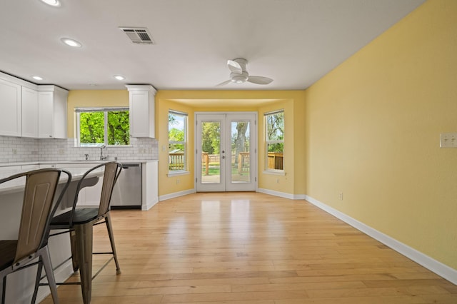 19702 Midland Dr, Redding, CA 96003 - interior space featuring baseboards, recessed lighting, french doors, a ceiling fan, and visible vents