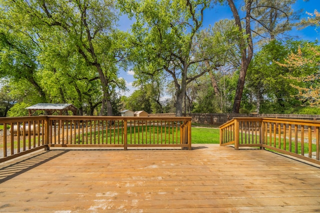 19702 Midland Dr, Redding, CA 96003 - deck with a yard, a fenced backyard, and an outbuilding