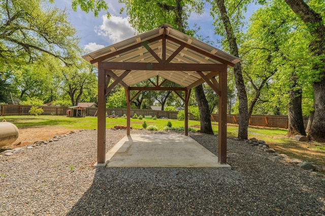 19702 Midland Dr, Redding, CA 96003 - view of home's community featuring a patio, a gazebo, a fenced backyard, and a lawn