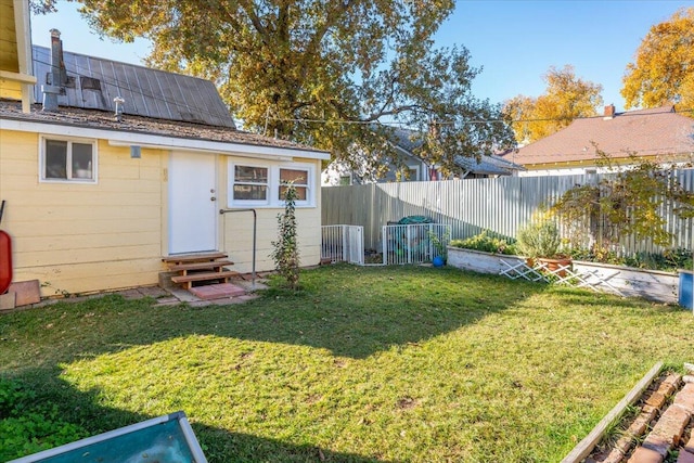 exterior space featuring entry steps and a fenced backyard