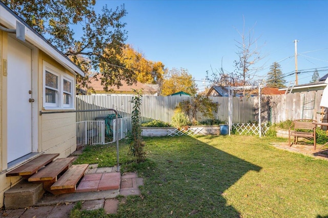 view of yard featuring a fenced backyard