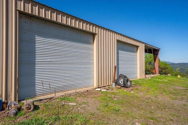 garage featuring a mountain view