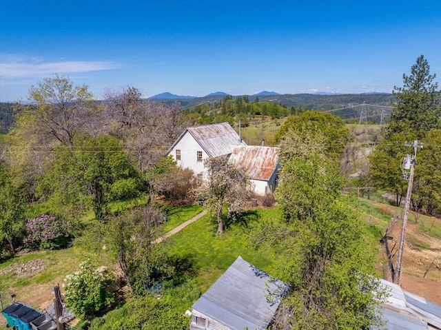 drone / aerial view featuring a mountain view