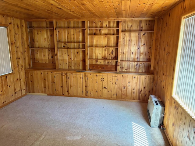 37061 Park Ave, Burney, CA 96013 - spare room featuring wooden walls, wooden ceiling, built in shelves, and carpet flooring
