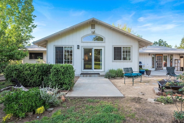 back of property featuring a patio