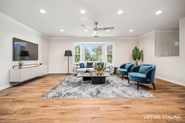living room with wood finished floors, baseboards, ceiling fan, ornamental molding, and recessed lighting