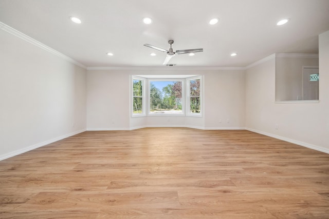 spare room featuring ornamental molding, baseboards, ceiling fan, and recessed lighting