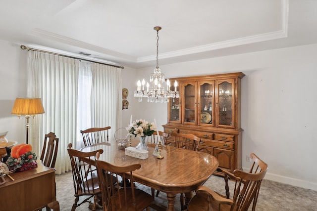 9400 Placer Rd, Redding, CA 96001 - dining space featuring baseboards, a chandelier, visible vents, a raised ceiling, and light colored carpet