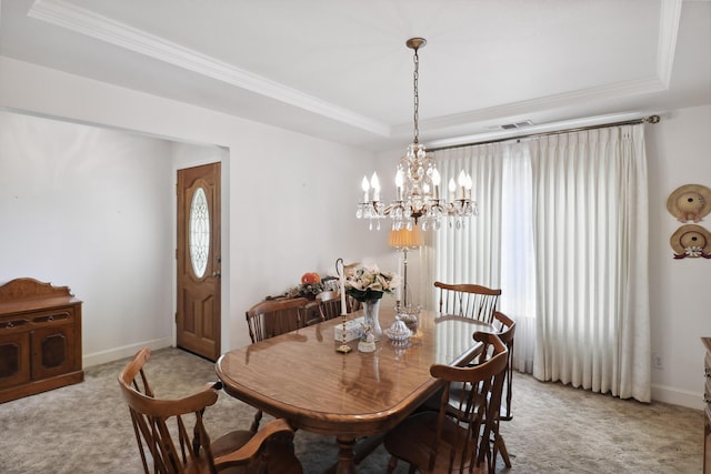 9400 Placer Rd, Redding, CA 96001 - dining area with a raised ceiling, crown molding, a chandelier, and light colored carpet