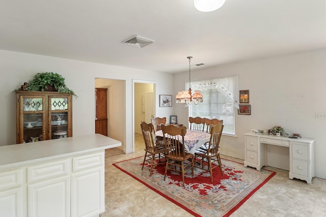 9400 Placer Rd, Redding, CA 96001 - dining room featuring an inviting chandelier and visible vents
