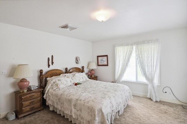 9400 Placer Rd, Redding, CA 96001 - carpeted bedroom with visible vents and baseboards