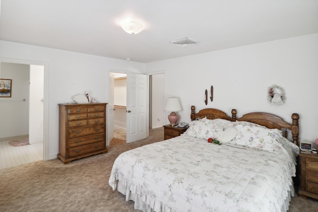 9400 Placer Rd, Redding, CA 96001 - bedroom with visible vents, a walk in closet, and carpet