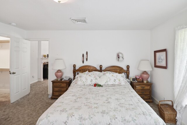 9400 Placer Rd, Redding, CA 96001 - carpeted bedroom with visible vents and baseboards