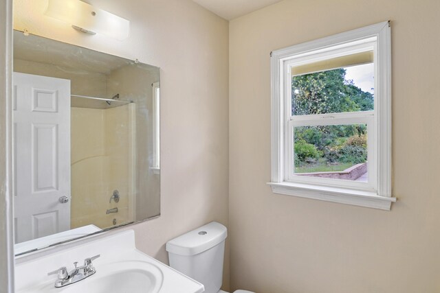 9400 Placer Rd, Redding, CA 96001 - full bathroom featuring toilet, shower / bath combination, and a sink
