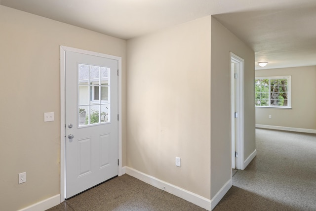 9400 Placer Rd, Redding, CA 96001 - doorway featuring carpet floors and baseboards