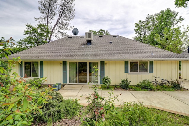 9400 Placer Rd, Redding, CA 96001 - back of house featuring a patio area, board and batten siding, and a shingled roof