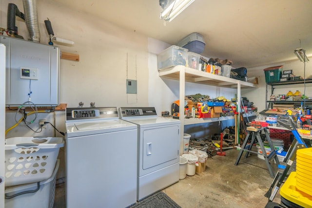 laundry area featuring laundry area, separate washer and dryer, and electric panel