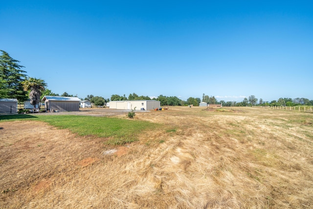 view of yard featuring a rural view
