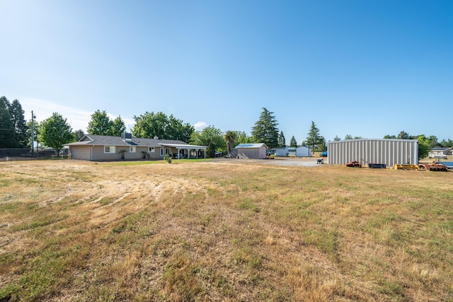 view of yard with fence
