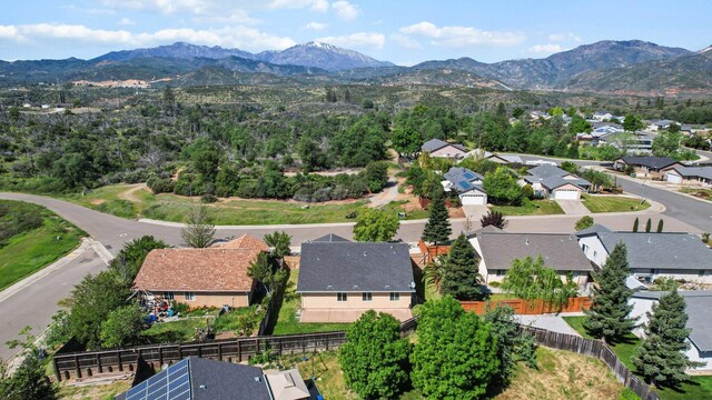 aerial view with a mountain view and a residential view