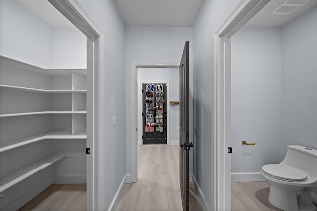2120 Tradition Way, Redding, CA 96001 - hallway featuring light wood-style floors