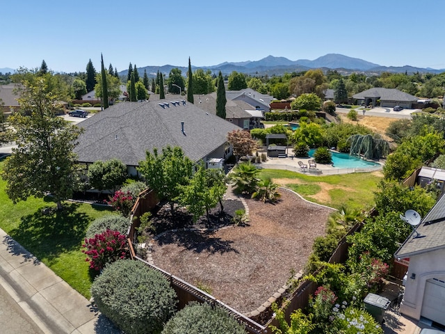 2120 Tradition Way, Redding, CA 96001 - aerial perspective of suburban area featuring a pool area and a mountain backdrop