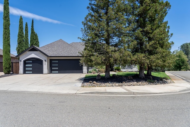 2120 Tradition Way, Redding, CA 96001 - view of front of house featuring an attached garage, concrete driveway, and a shingled roof