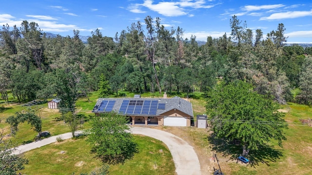 drone / aerial view with a forest view