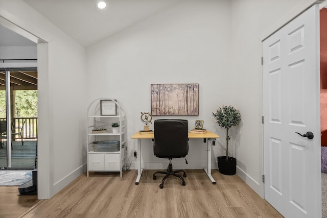 office with light wood-style floors, recessed lighting, vaulted ceiling, and baseboards