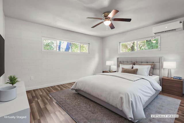 1331 Harpole Rd Unit A, Redding, CA 96002 - bedroom with dark wood finished floors, ceiling fan, and a wall mounted air conditioner