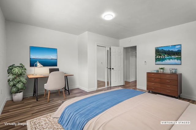 1331 Harpole Rd Unit A, Redding, CA 96002 - bedroom featuring baseboards, wood finished floors, and a closet