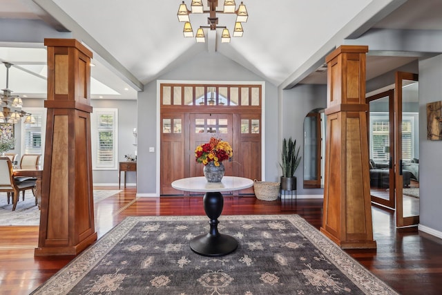 15320 Middletown Park Dr, Redding, CA 96001 - foyer with a chandelier, wood finished floors, ornate columns, and vaulted ceiling