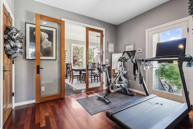 15320 Middletown Park Dr, Redding, CA 96001 - exercise room featuring dark wood-style flooring and baseboards