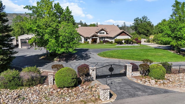 15320 Middletown Park Dr, Redding, CA 96001 - obstructed view of property with a gate and curved driveway