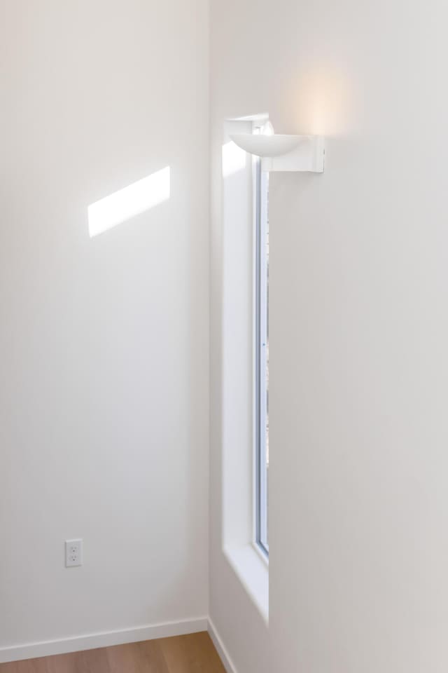 details with wood finished floors and baseboards