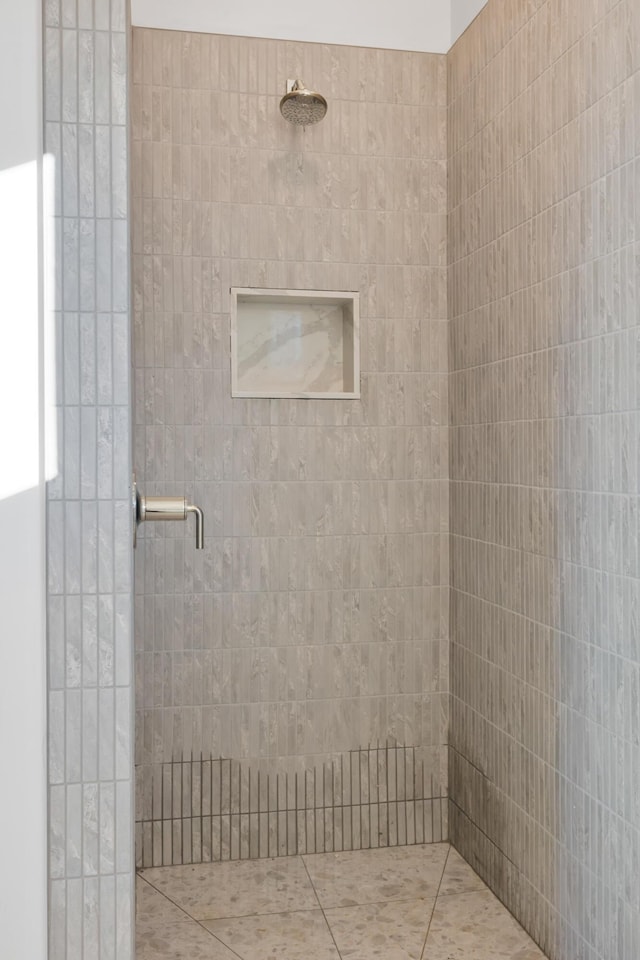 full bath featuring a shower stall