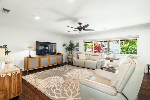 6860 Riata Dr, Redding, CA 96002 - living room featuring ornamental molding, a ceiling fan, a healthy amount of sunlight, and wood finished floors