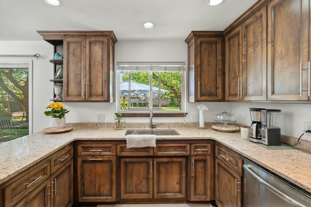 6860 Riata Dr, Redding, CA 96002 - kitchen with open shelves, dishwasher, a healthy amount of sunlight, and a sink