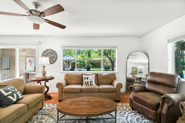 6860 Riata Dr, Redding, CA 96002 - living room with a ceiling fan and wood finished floors