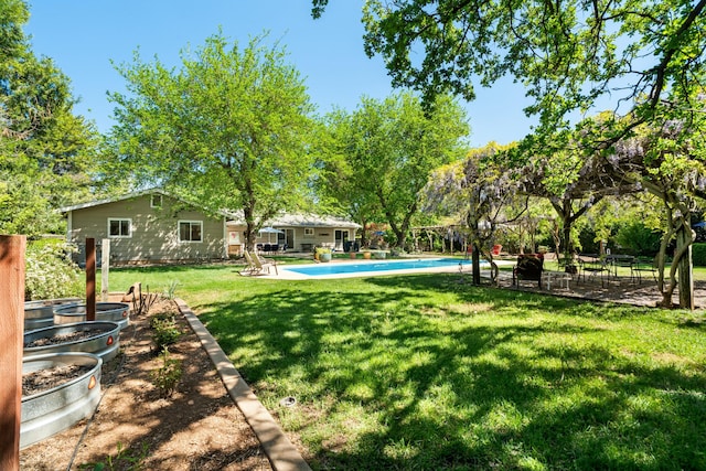 6860 Riata Dr, Redding, CA 96002 - view of yard with an outdoor pool and a patio area
