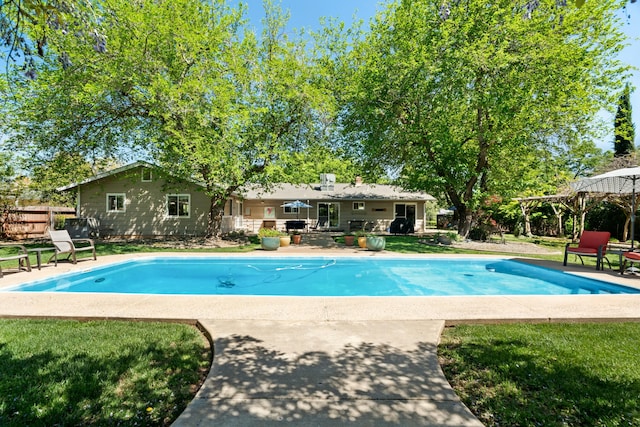 6860 Riata Dr, Redding, CA 96002 - outdoor pool with fence, a lawn, a gazebo, and a patio
