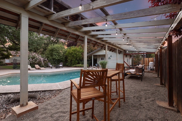 7057 Riata Dr, Redding, CA 96002 - view of pool with a patio, a fenced backyard, and an outdoor structure