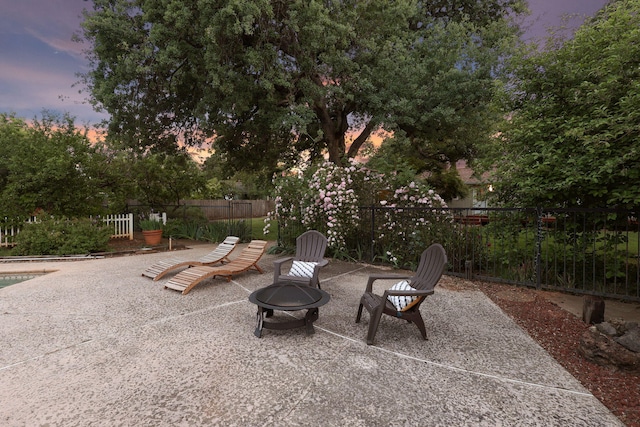 7057 Riata Dr, Redding, CA 96002 - view of patio / terrace featuring a fire pit and fence