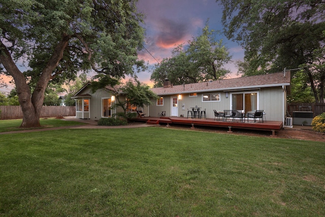 7057 Riata Dr, Redding, CA 96002 - rear view of house featuring a wooden deck and a chimney