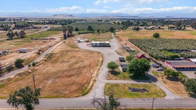 4647 County Road Ff, Orland, CA 95963 - aerial view of sparsely populated area with rows of crops and a mountain backdrop