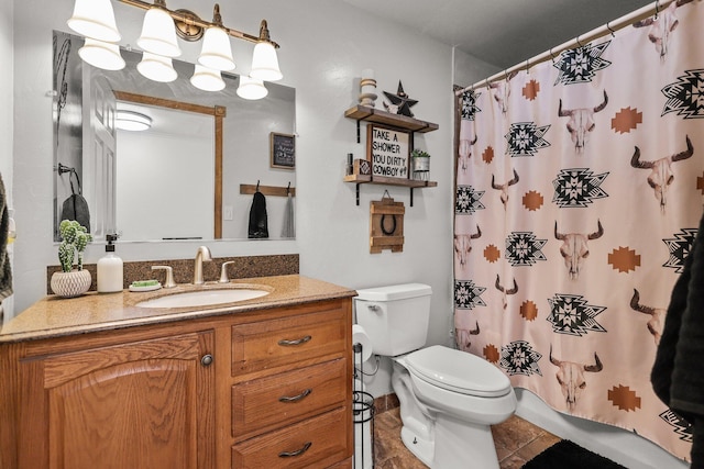 4647 County Road Ff, Orland, CA 95963 - full bath with toilet, vanity, a shower with shower curtain, and tile patterned floors
