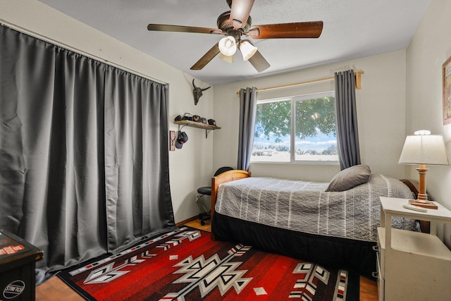 4647 County Road Ff, Orland, CA 95963 - bedroom with wood finished floors and ceiling fan