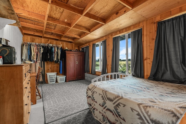 4647 County Road Ff, Orland, CA 95963 - bedroom featuring wooden walls, beamed ceiling, wooden ceiling, and carpet