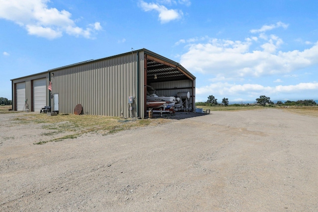 4647 County Road Ff, Orland, CA 95963 - view of pole building featuring dirt driveway
