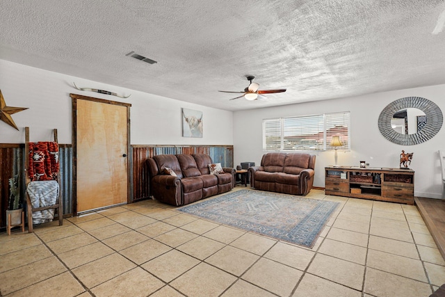 4647 County Road Ff, Orland, CA 95963 - living room with ceiling fan, light tile patterned floors, and a textured ceiling